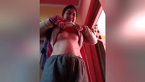Bhabhi makes her way in a sexy dress on her webcam