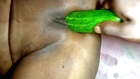 Busty indian girl gets her pussy fucked with her cucumber