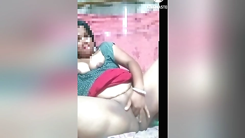 Indian brunette milf fucks herself on her bed in public video