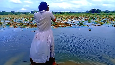 Indian girl in a pink bikini and white shirt in solo