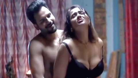 A sexy indian brunette with big tits is having fun with a guy