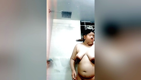 Indian brunette in sexy lingerie bathed in the shower