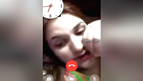 sexy red-haired babe plays with her boobs and pussy