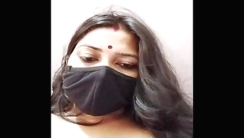 Busty indian girl with huge boobies shows off her hairy pussy