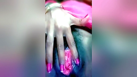 Indian wife in her bedroom plays with her hairy pussy