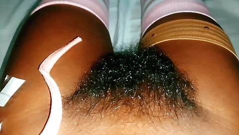 Sexy indian amateur slut with hairy pussy is fucking herself