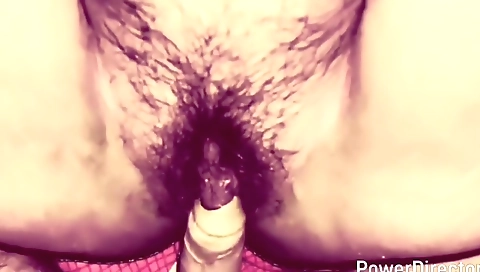 Indian mature playing with her hairy ass in the bedroom