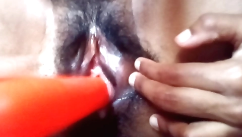 Indian housewife masturbates on the bed on the couch