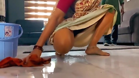 Indian woman gets a view of her huge breasts and a sexy dress