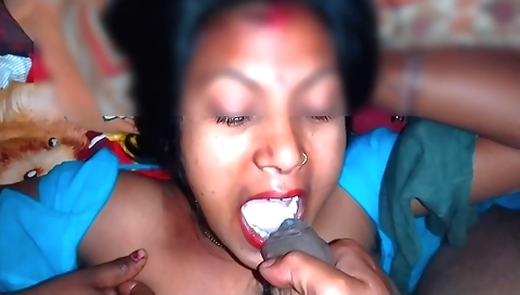 Indian brunette gets a facial and handjob in the bedroom