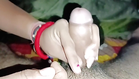 Beautiful chick getting a handjob and blowjob from a man