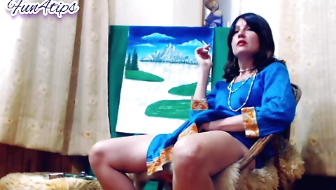 Amateur brunette smoking from the camera in the room