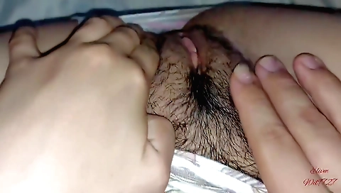 Sexy brunette takes off her clothes and plays with pussy