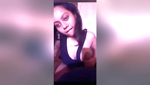 Indian hottie is giving a hot handjob to her boyfriend