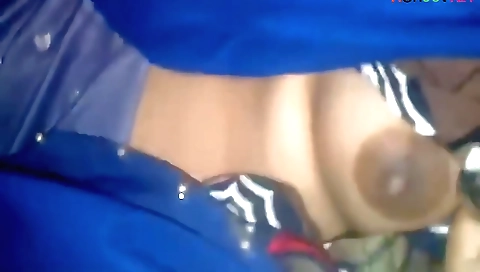 Indian solo female in a red bikini riding a car in the bus