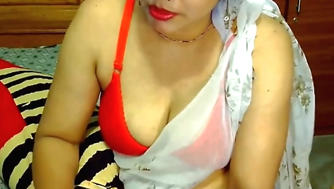 Indian brunette enjoys sex with a big dick in her mouth