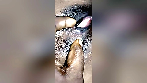 Desi babe with hairy pussy does oral sex on camera